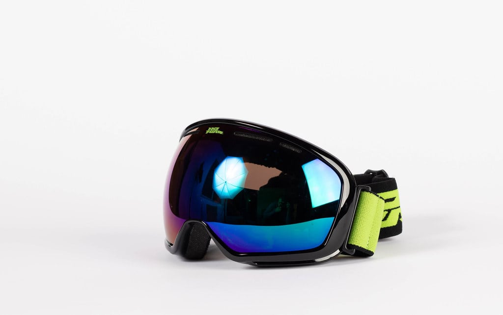 Ski goggles on a white background.